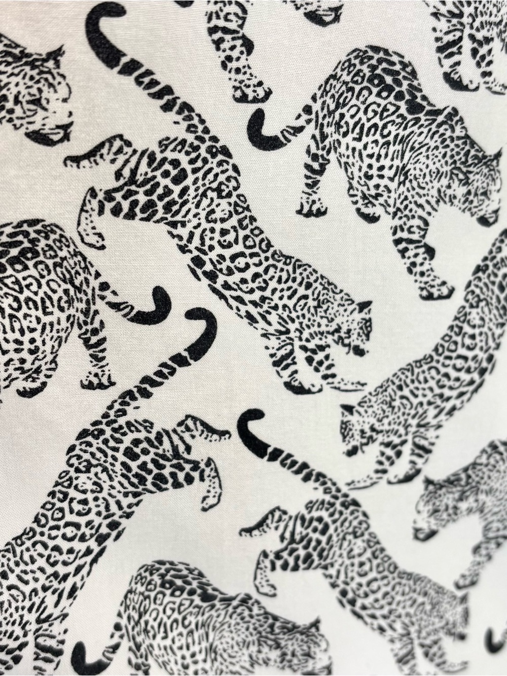 White and black leopard motif shirt